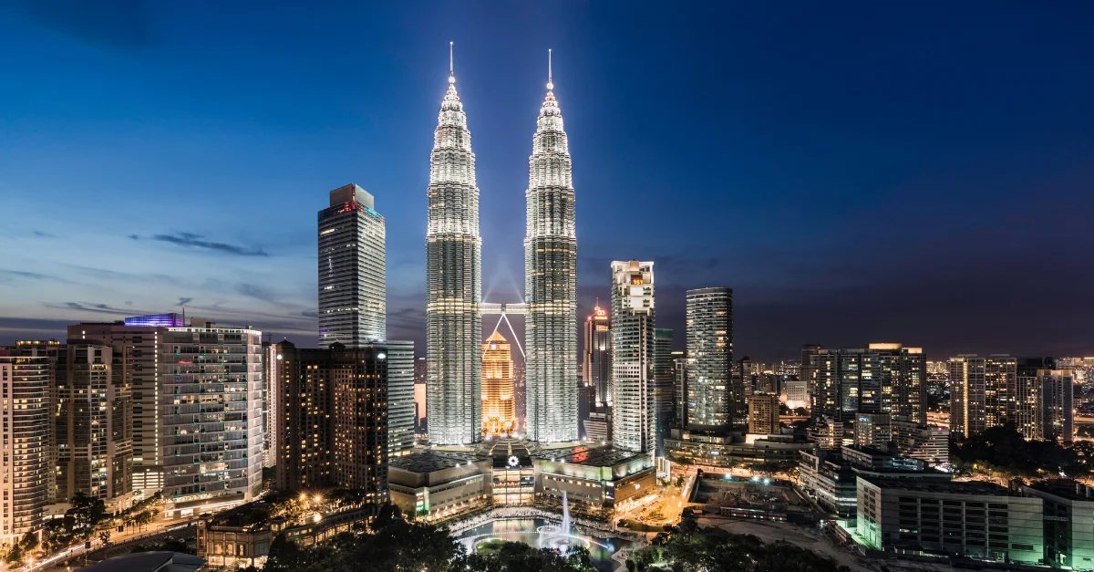 The illuminated Petronas Twin Towers in Kuala Lumpur
